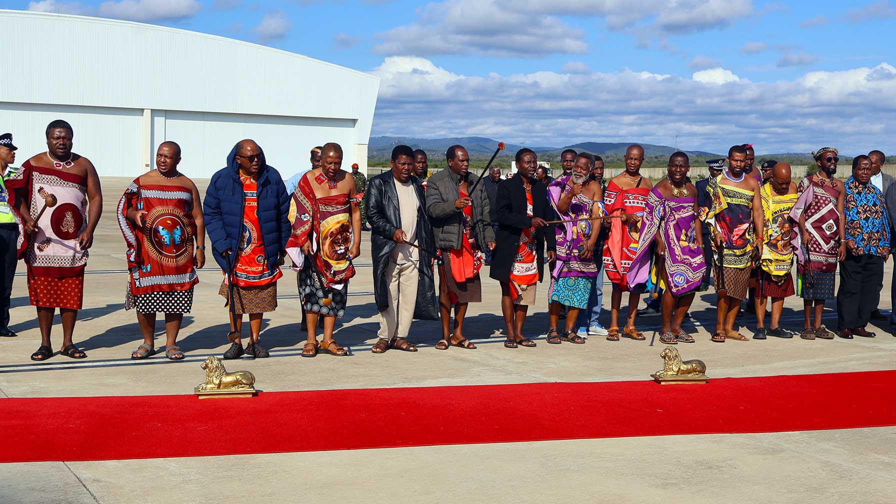 LaCwebetelako break into song at the King Mswati III International Airport yesterday as they wished His Majesty King Mswati III a safe journey ahead of his international diplomatic tour.